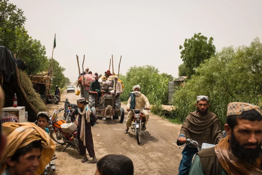 Explore the Taliban government's land grabbing policy. Ostensibly anti-corruption, it targets minorities and rivals, causing a humanitarian crisis.