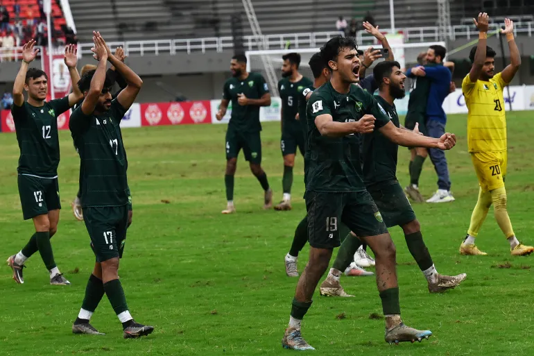 Pakistan's players celebrate their win over Cambodia at the Jinnah Sports Stadium in Islamabad - Aamir Quraishi/AFP