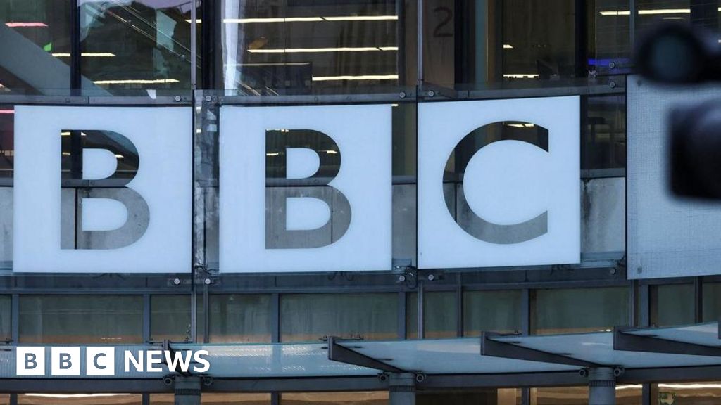 BBC newsroom used to illustrate discussions about editorial standards, conflict reporting, and terminology used for designated terrorist organisations.